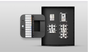 Avigilon access control badge panel showing a wall-mounted controller and four access control boards inside an enclosure.